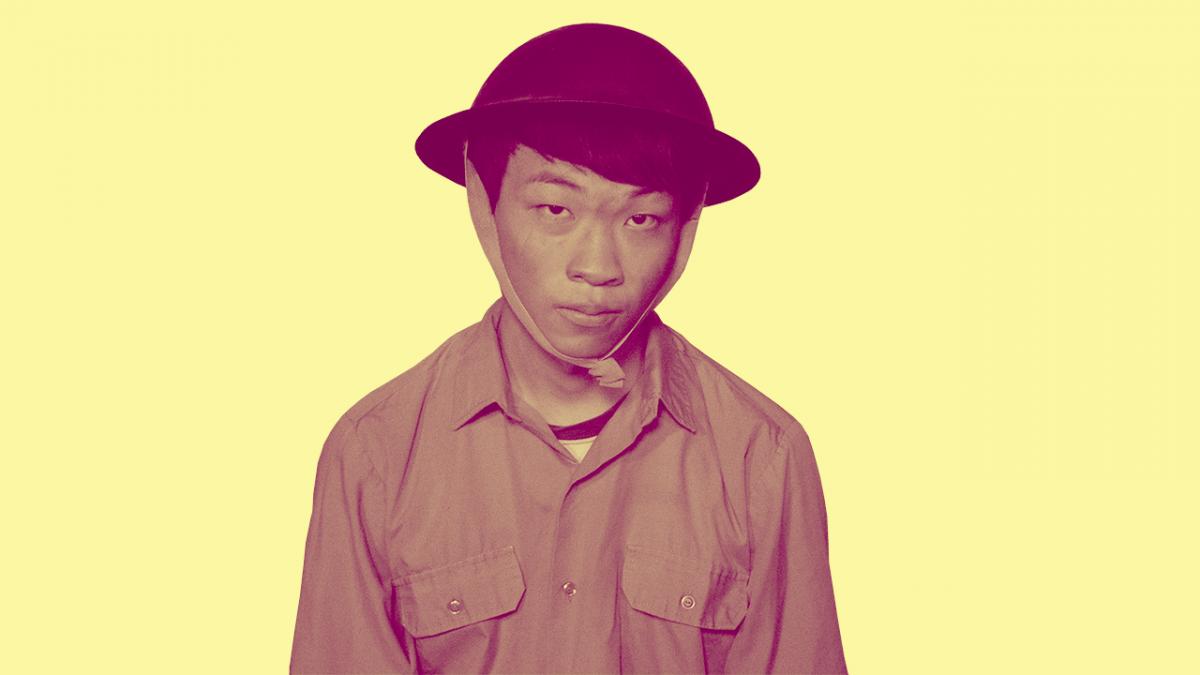 young soldier in a misfitting uniform