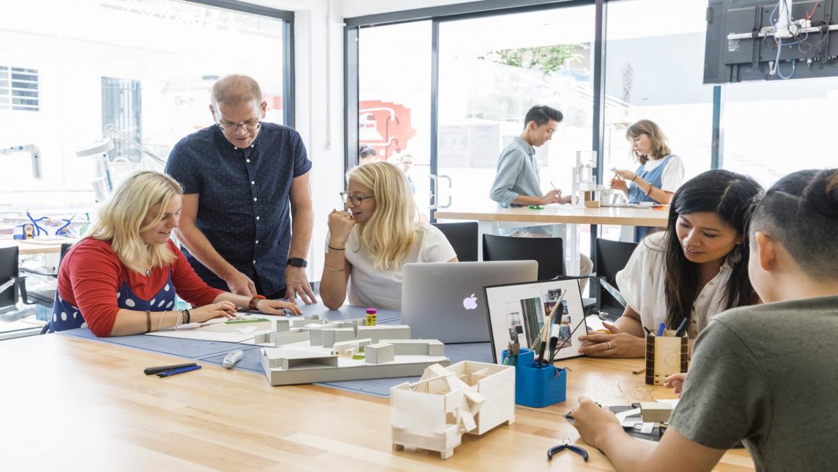 students and staff working