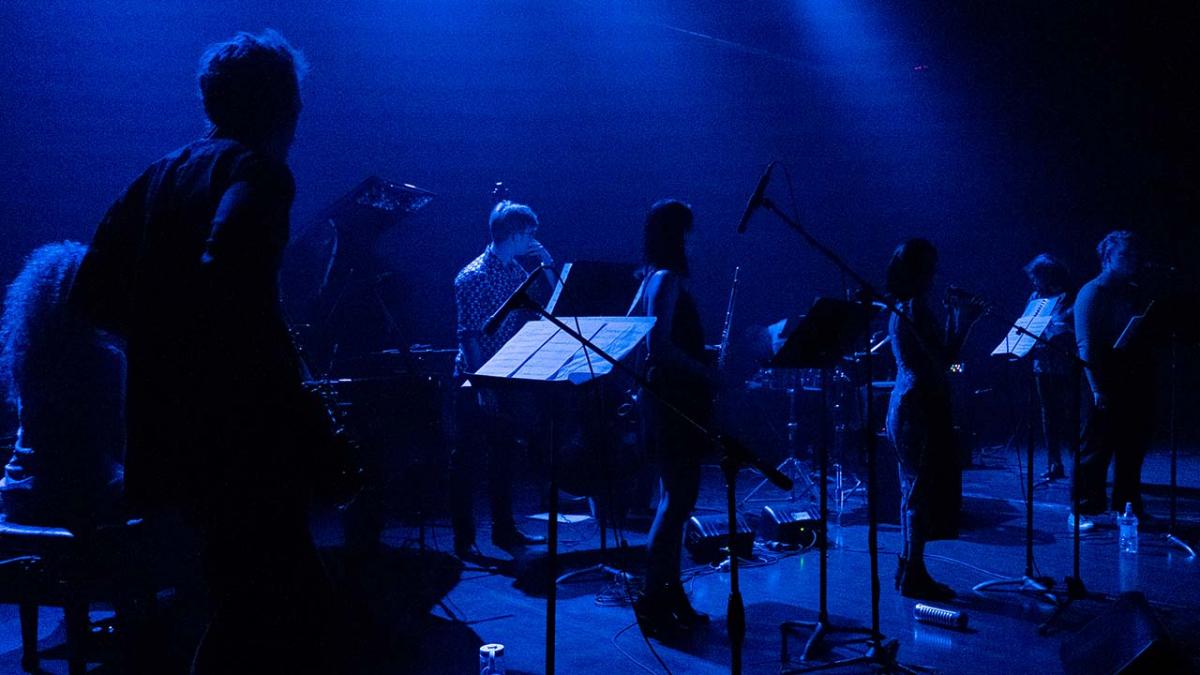 blue lights silhouette the band