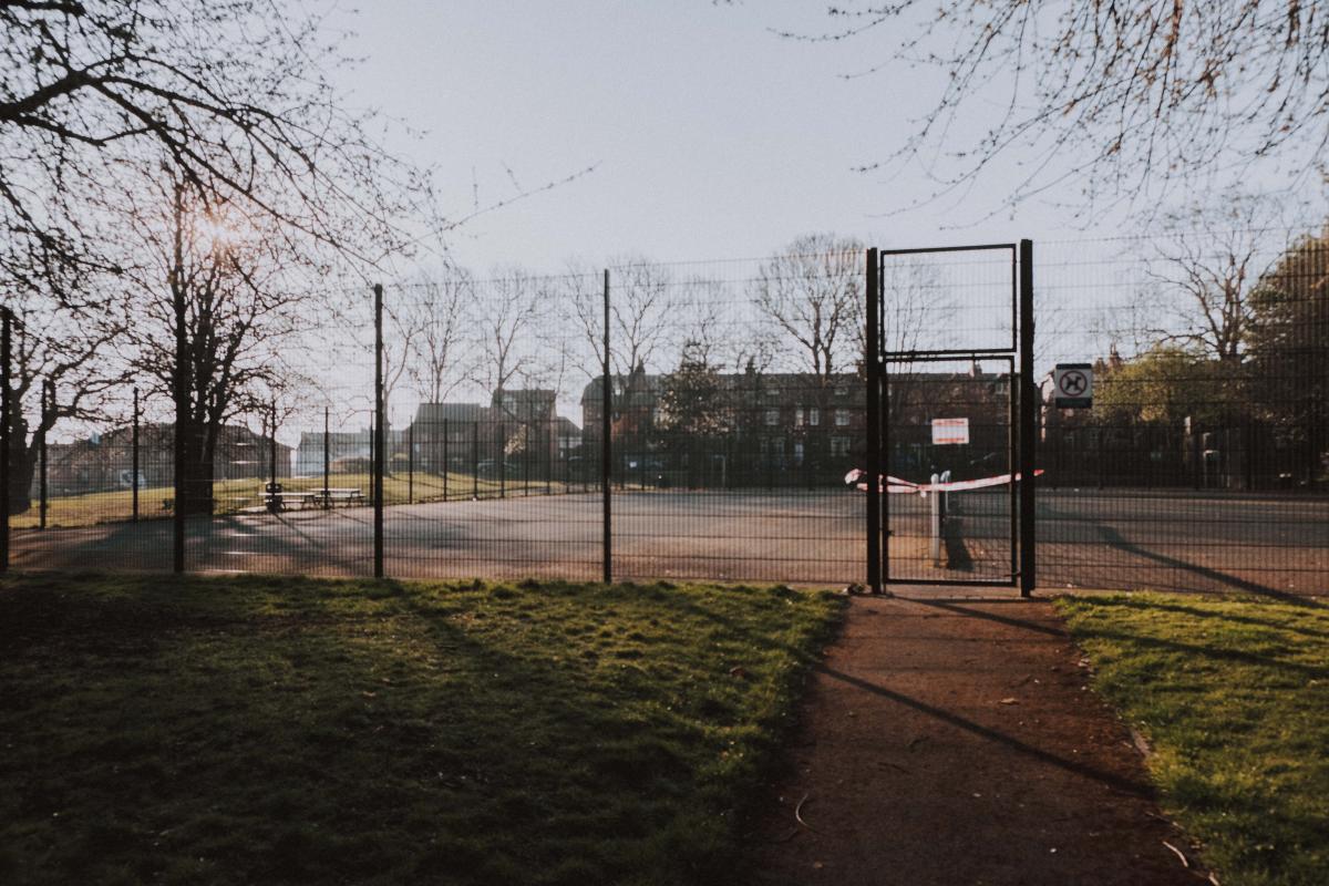 photo of a playground gate tapped up