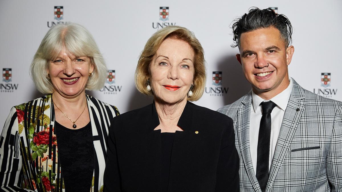 photo of two men and a man