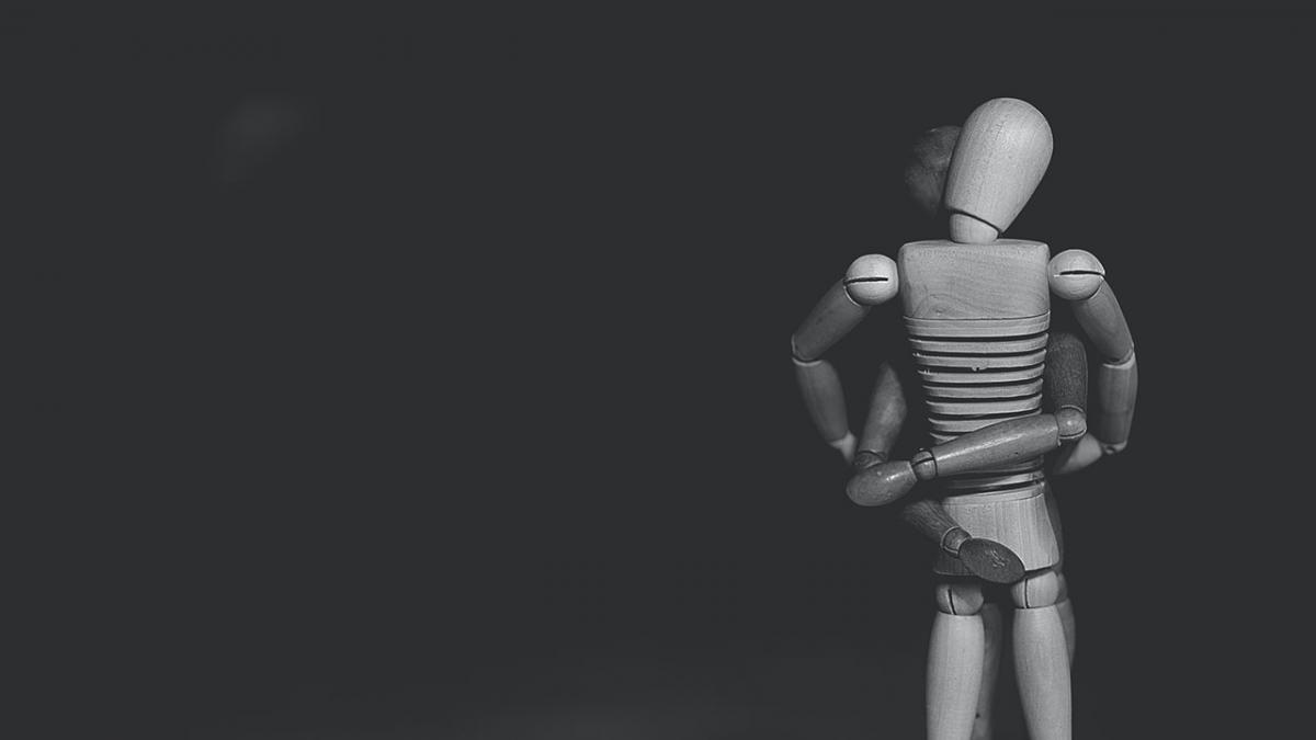 Two mannequins embracing