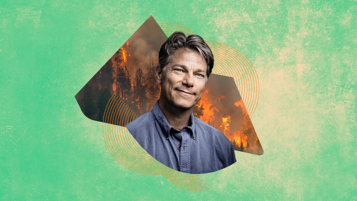 Image of John Vaillant with forest fire burning behind him